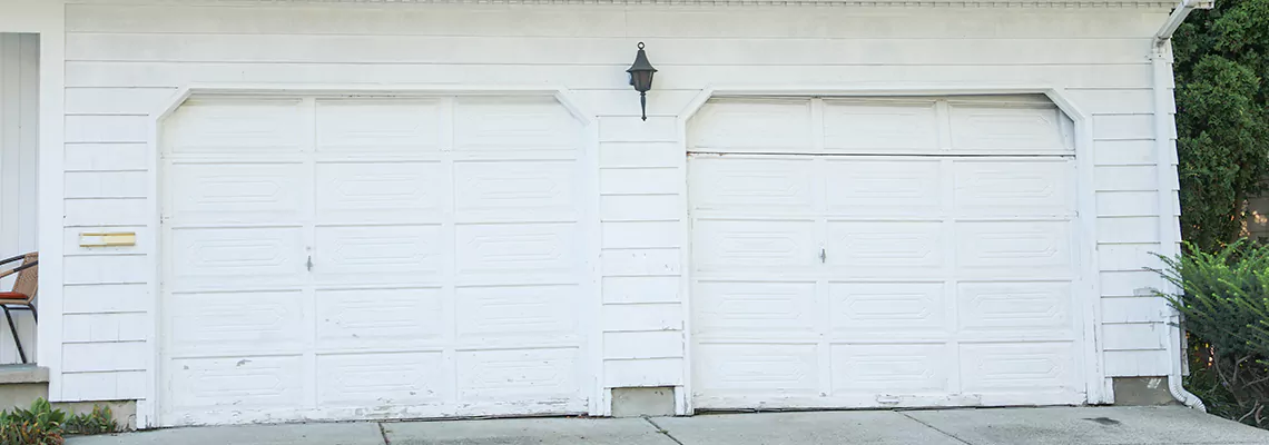 Roller Garage Door Dropped Down Replacement in Tallahassee, FL