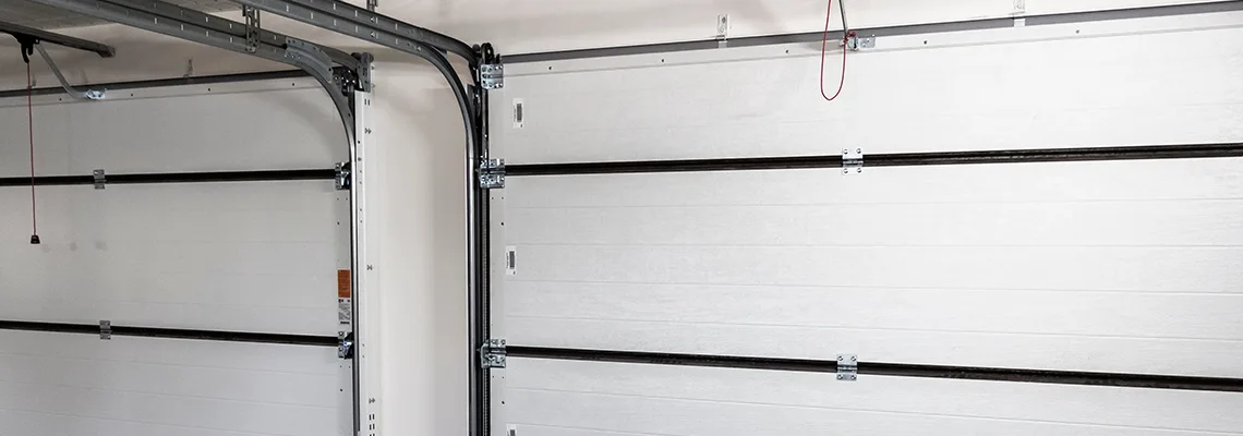 Fix Folding Garage Door Jerking in Tallahassee, Florida