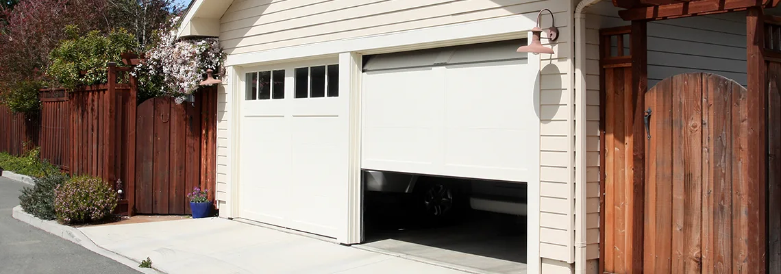Fix Metal Garage Door Jerking in Tallahassee, Florida